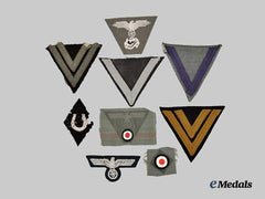 Germany, Third Reich. A Mixed Lot of Nine Uniform Insignia