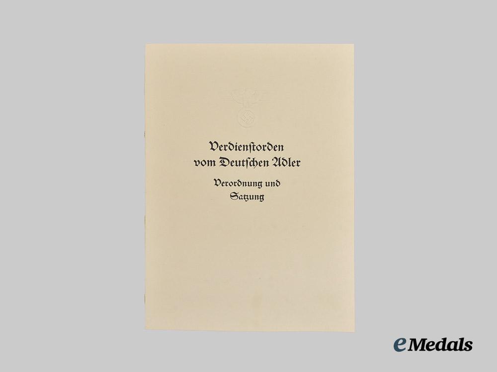 germany,_third_reich._the_statutes_and_award_document_for_an_order_of_the_german_eagle,_i_i_class_cross_with_breast_star,_to_ivo_bagli___m_n_c7096