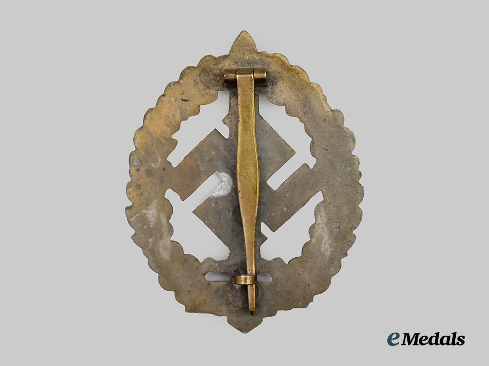 germany,_third_reich._an_s_a_military_sports_badge_for_war_wounded,_bronze_grade,_by_werner_redo_of_saarlautern,_type_i_i_i___m_n_c7111