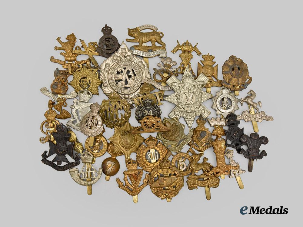 united_kingdom._a_lot_of_forty-_one_first_war_era_cap,_collar_and_glengarry_badges___m_n_c7312