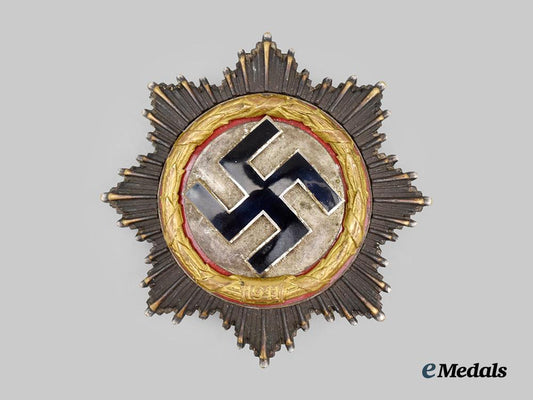 germany,_wehrmacht._a_german_cross_in_gold,_heavy_version,_by_deschler&_sohn___m_n_c7451