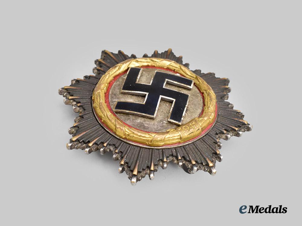 germany,_wehrmacht._a_german_cross_in_gold,_heavy_version,_by_deschler&_sohn___m_n_c7452