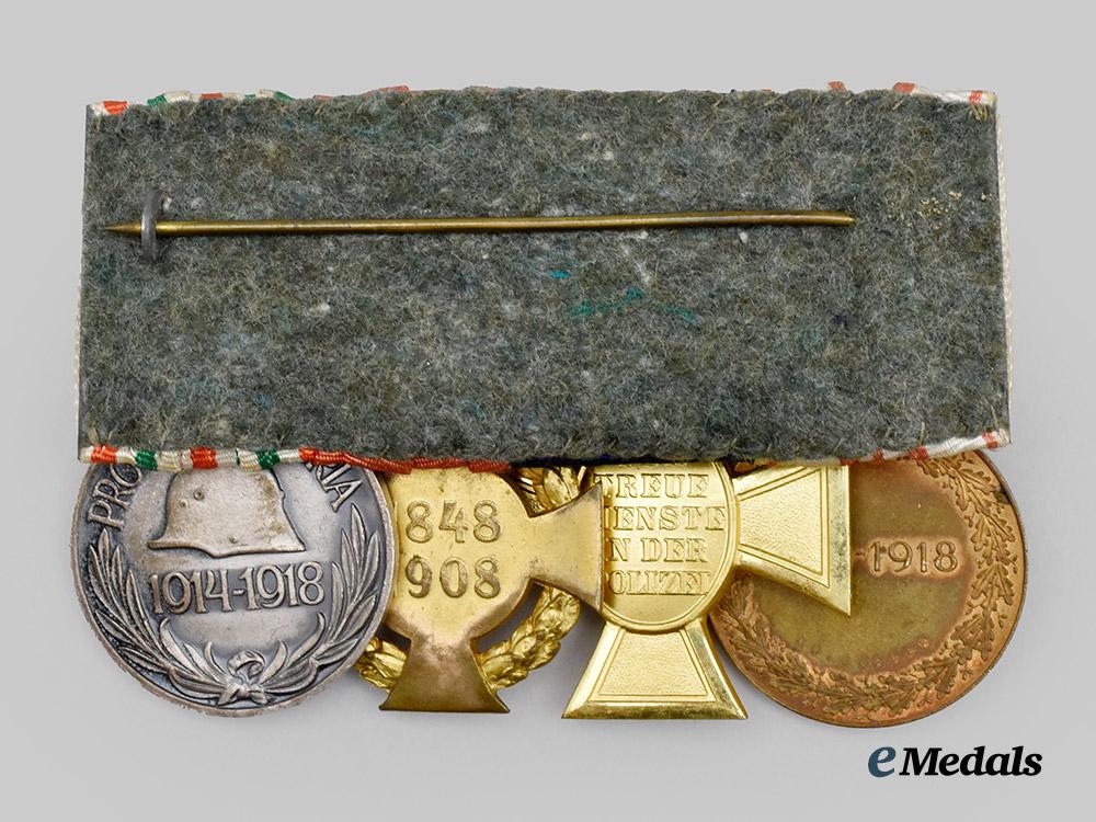 germany,_third_reich._a_medal_bar_to_an_austrian-_hungarian_first_world_war_combatant_with_post-_anschluss_police_service___m_n_c7478