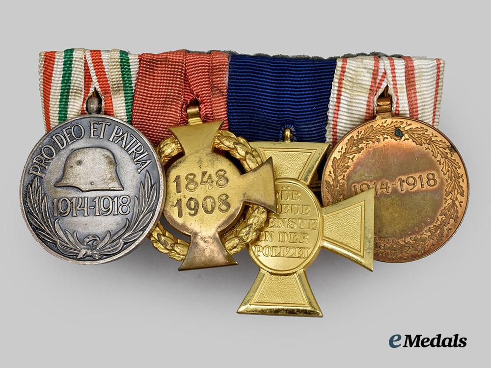 germany,_third_reich._a_medal_bar_to_an_austrian-_hungarian_first_world_war_combatant_with_post-_anschluss_police_service___m_n_c7480