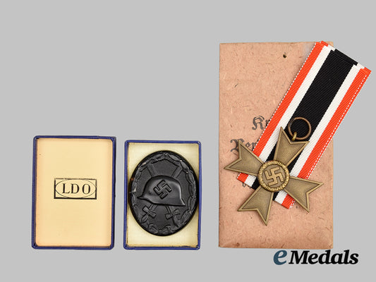 germany,_wehrmacht._a_pair_of_decorations___m_n_c7504