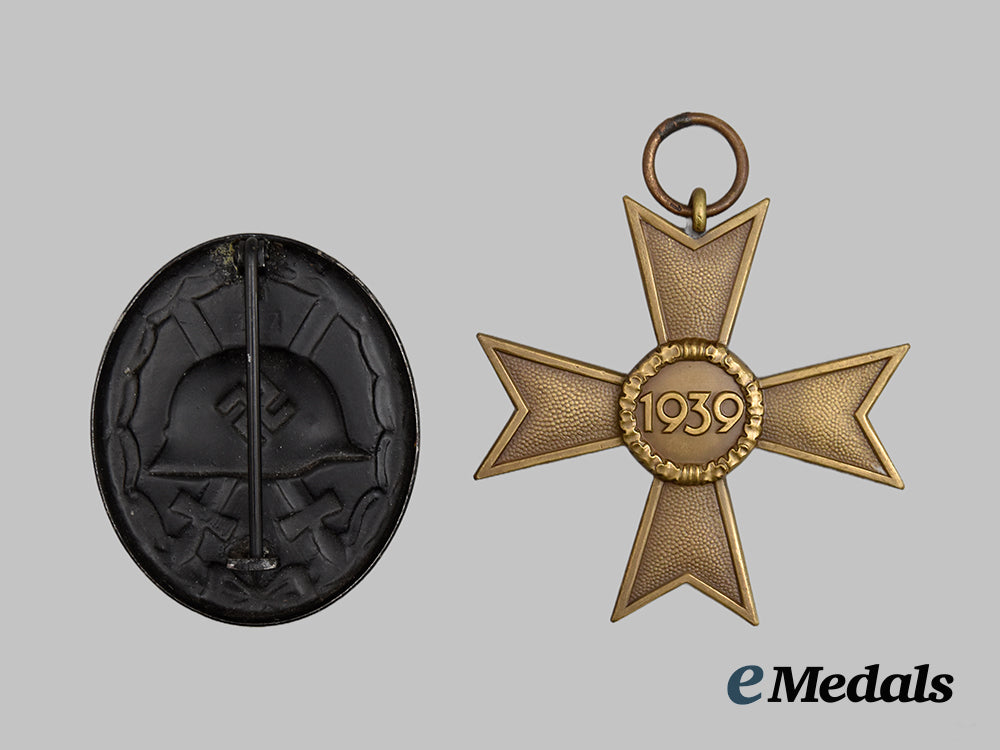 germany,_wehrmacht._a_pair_of_decorations___m_n_c7508