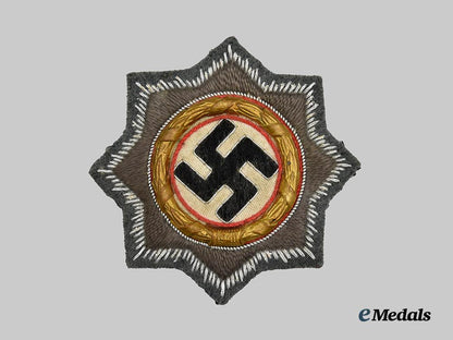 germany,_wehrmacht._a_rare_german_cross_in_gold,_cloth_version_for_assault_gun_troops,_with_dietrich_maerz_certification___m_n_c7666