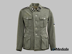 Germany, SS. A Rare 20th Waffen Grenadier Division of the SS (1st Estonian) Sturmmann’s Service Tunic, by Gebrüder Pluskiewitz