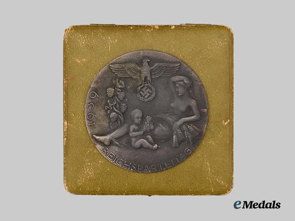 germany,_n_s_d_a_p._a1939_nuremberg_rally_sports_games_second_place_victor’s_plaque,_with_case,_by_carl_poellath___m_n_c7854