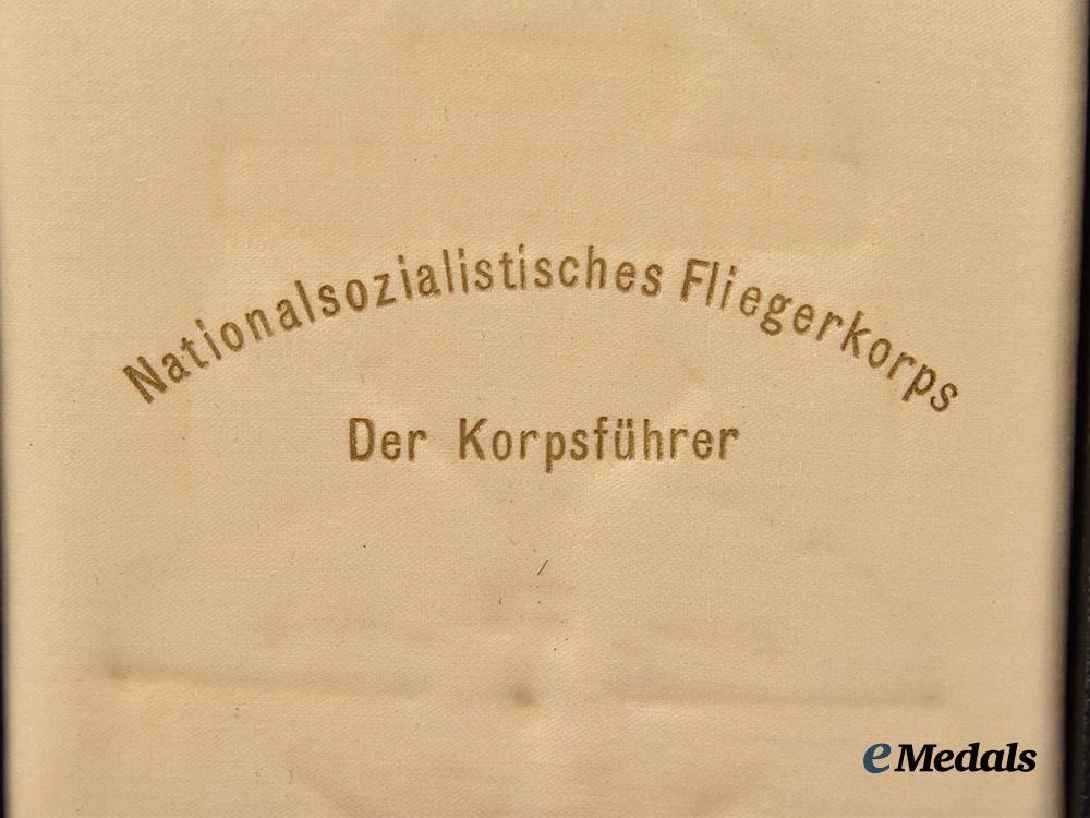 germany,_n_s_f_k._a1939_ostland_flight_participant’s_plaque,_with_case,_by_gustav_brehmer___m_n_c7881