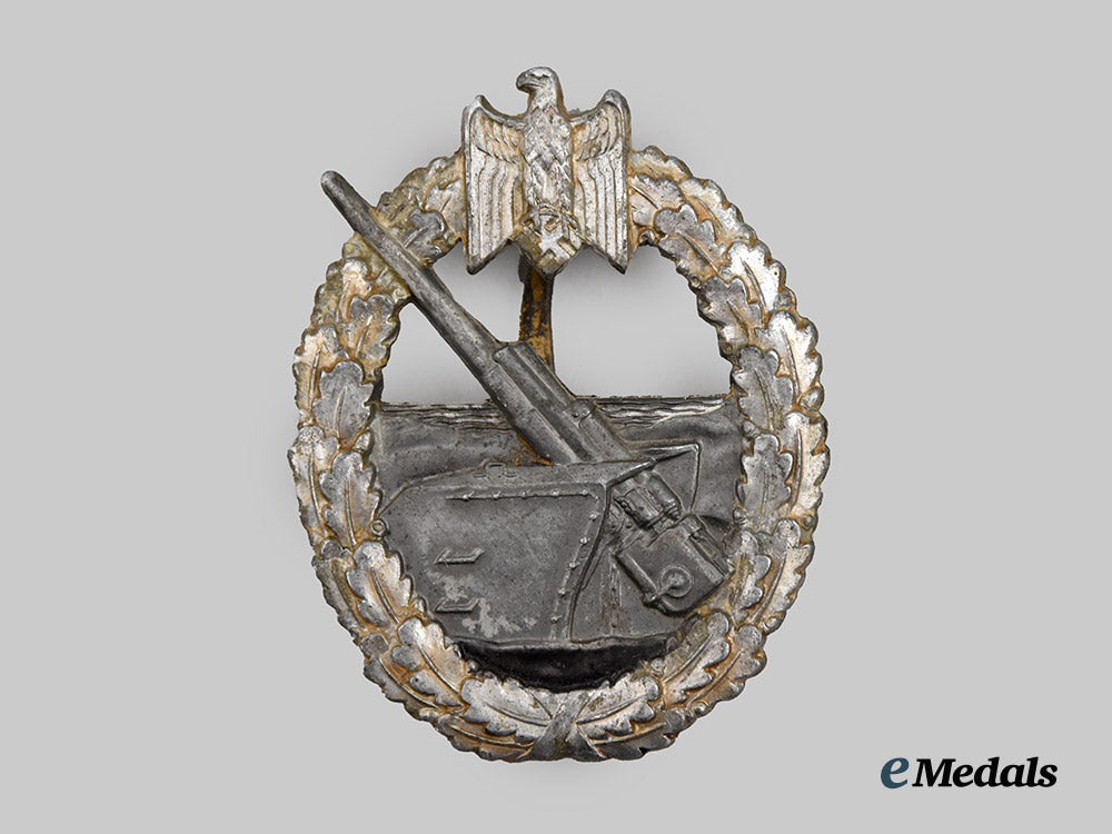 germany,_kriegsmarine._a_coastal_artillery_war_badge,_by_c._e._juncker___m_n_c7890