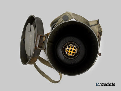 germany,_heer._a_mint_mid-_war_m38_gas_mask_and_canister,_by_drägerwerk___m_n_c8161
