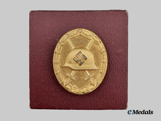 germany,_wehrmacht._a_gold_grade_wound_badge,_with_period_case,_by_the_vienna_mint___m_n_c8173