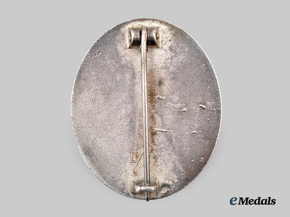 germany,_third_reich._a_silver_grade_wound_badge,_late-_war_example,_by_förster&_barth___m_n_c8250