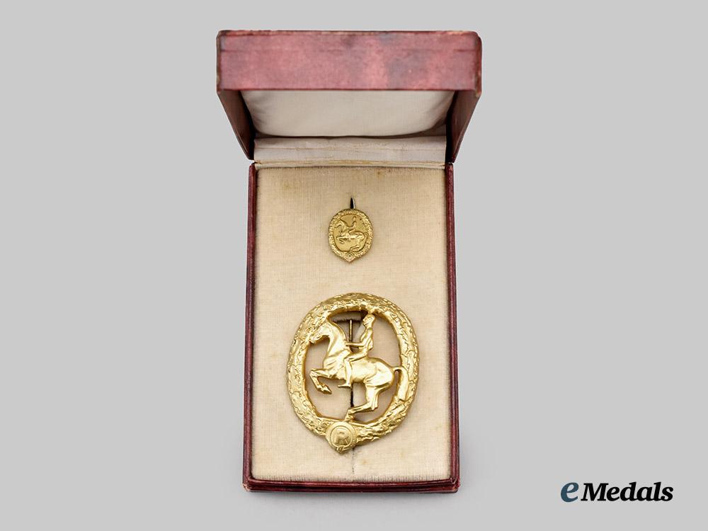 germany,_third_reich._a_rare_and_mint_german_horseman’s_badge,_gold_grade_with_miniature_and_case,_by_l._christian_lauer___m_n_c8263