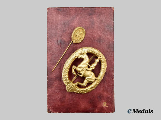 germany,_third_reich._a_rare_and_mint_german_horseman’s_badge,_gold_grade_with_miniature_and_case,_by_l._christian_lauer___m_n_c8266