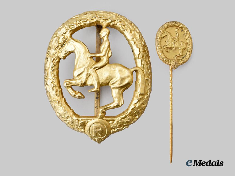 germany,_third_reich._a_rare_and_mint_german_horseman’s_badge,_gold_grade_with_miniature_and_case,_by_l._christian_lauer___m_n_c8267