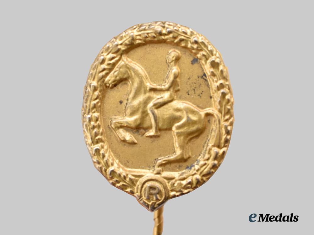 germany,_third_reich._a_rare_and_mint_german_horseman’s_badge,_gold_grade_with_miniature_and_case,_by_l._christian_lauer___m_n_c8268