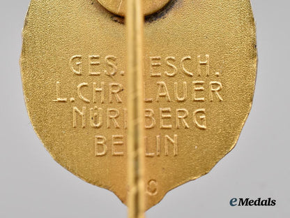 germany,_third_reich._a_rare_and_mint_german_horseman’s_badge,_gold_grade_with_miniature_and_case,_by_l._christian_lauer___m_n_c8272
