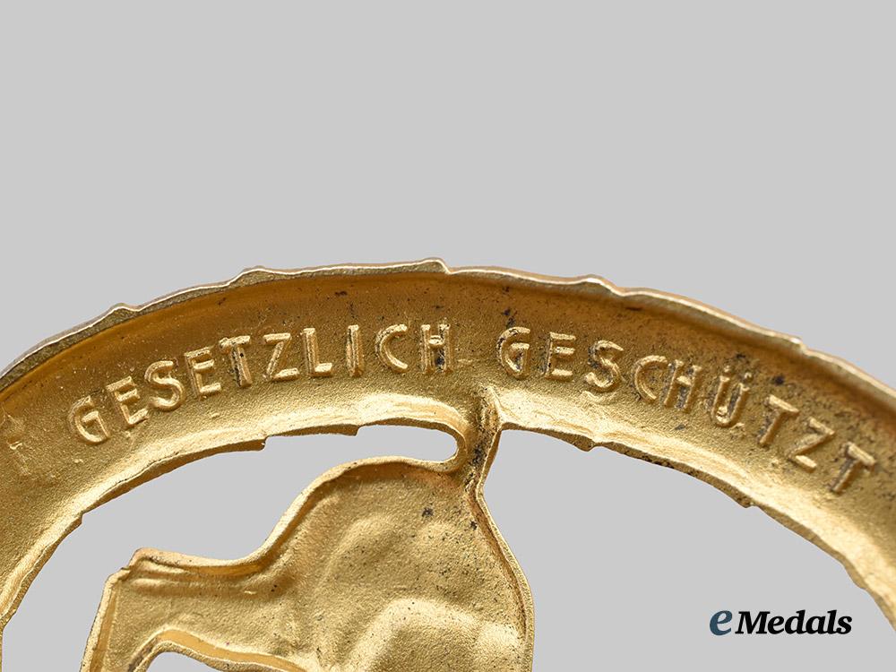 germany,_third_reich._a_rare_and_mint_german_horseman’s_badge,_gold_grade_with_miniature_and_case,_by_l._christian_lauer___m_n_c8273