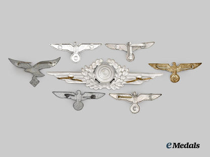 germany,_wehrmacht._a_mixed_lot_of_visor_cap_insignia___m_n_c8345