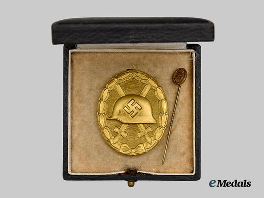 germany,_wehrmacht._a_gold_grade_wound_badge,_with_case_and_stick_pin_miniature,_by_the_vienna_mint___m_n_c8351