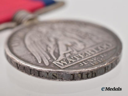 united_kingdom._a_waterloo_medal_to_private_james_vallis,11th_regiment,_light_dragoons___m_n_c8370