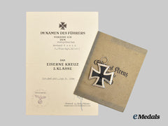 Germany, Luftwaffe. A 1939 Iron Cross II Class, by Steinhauer & Lück, with Award Document to Obergefreiter Gerhard Kunik