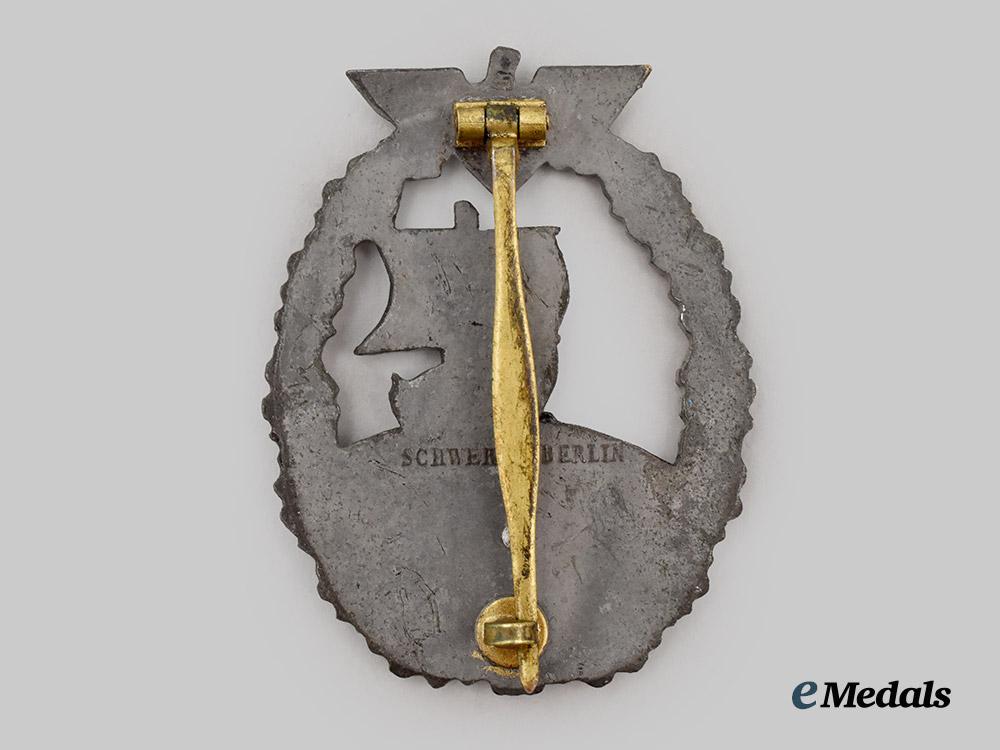 germany,_kriegsmarine._an_auxiliary_cruiser_war_badge,_late-_war_example,_by_schwerin___m_n_c8836