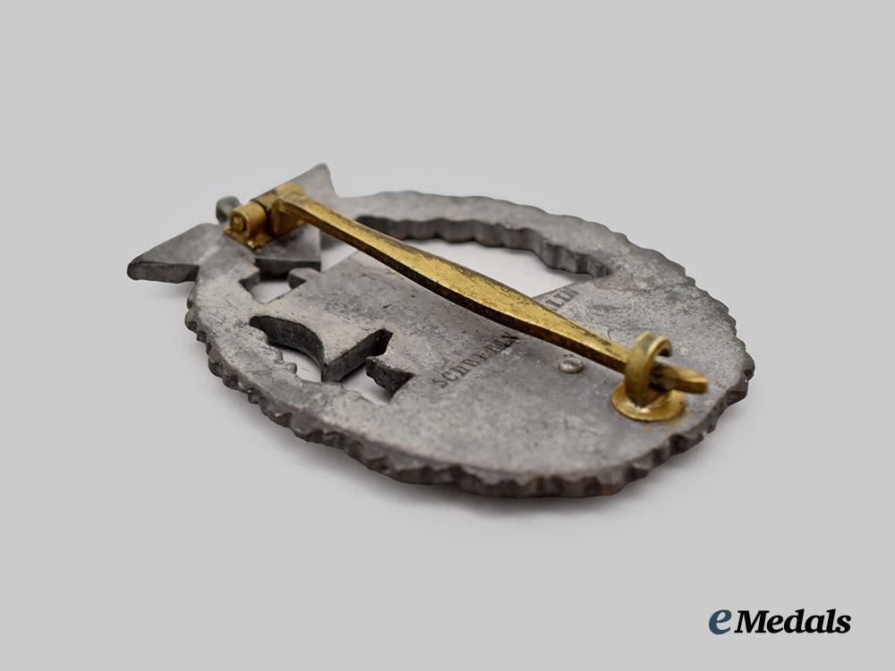 germany,_kriegsmarine._an_auxiliary_cruiser_war_badge,_late-_war_example,_by_schwerin___m_n_c8837