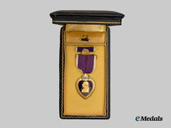 United States. A Cased Purple Heart Medal to Frank W. Kuss