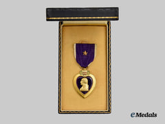 United States. A Cased Purple Heart Medal with Additional Wound Star
