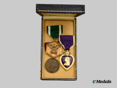 United States. A Lot of Three Medals and Awards to Carson E. Carroll (Purple Heart, Commendation Medal, Good Conduct Medal)