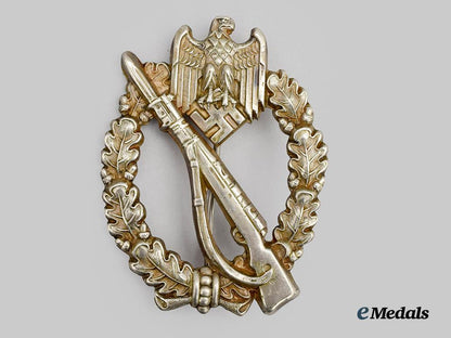 germany,_wehrmacht._an_infantry_assault_badge,_silver_grade,_by_c._e._juncker___m_n_c9097