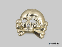 Germany, SS. A Mint Allgemeine SS First Pattern Totenkopf Visor Cap Insignia