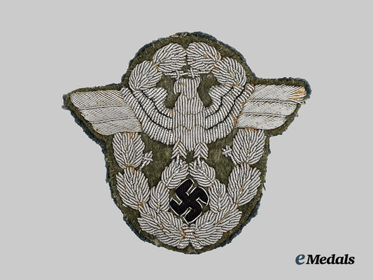 germany,_ordnungspolizei._a_schutzpolizei_officer’s_sleeve_eagle___m_n_c9192