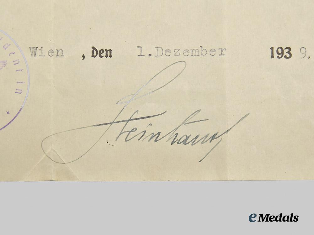 germany,_heer._a_pair_of_award_documents_to_hauptmann_der_reserve_karl_rapp,_panzer_troops___m_n_c9376