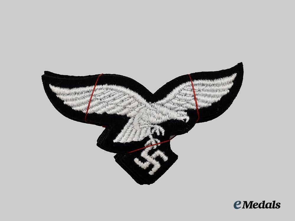 germany,_luftwaffe._a_lot_of_mint_and_unissued1st_fallschirm-_panzer_division_hermann_göring_uniform_eagles___m_n_c9488