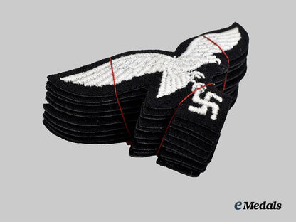 germany,_luftwaffe._a_lot_of_mint_and_unissued1st_fallschirm-_panzer_division_hermann_göring_uniform_eagles___m_n_c9490