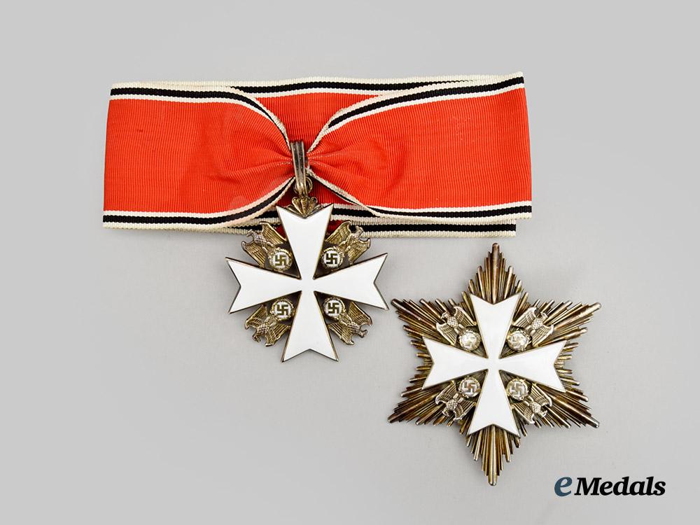 germany,_third_reich._an_order_of_the_german_eagle,_i_i_class_cross_with_breast_star_and_case,_by_gebrüder_godet___m_n_c9497