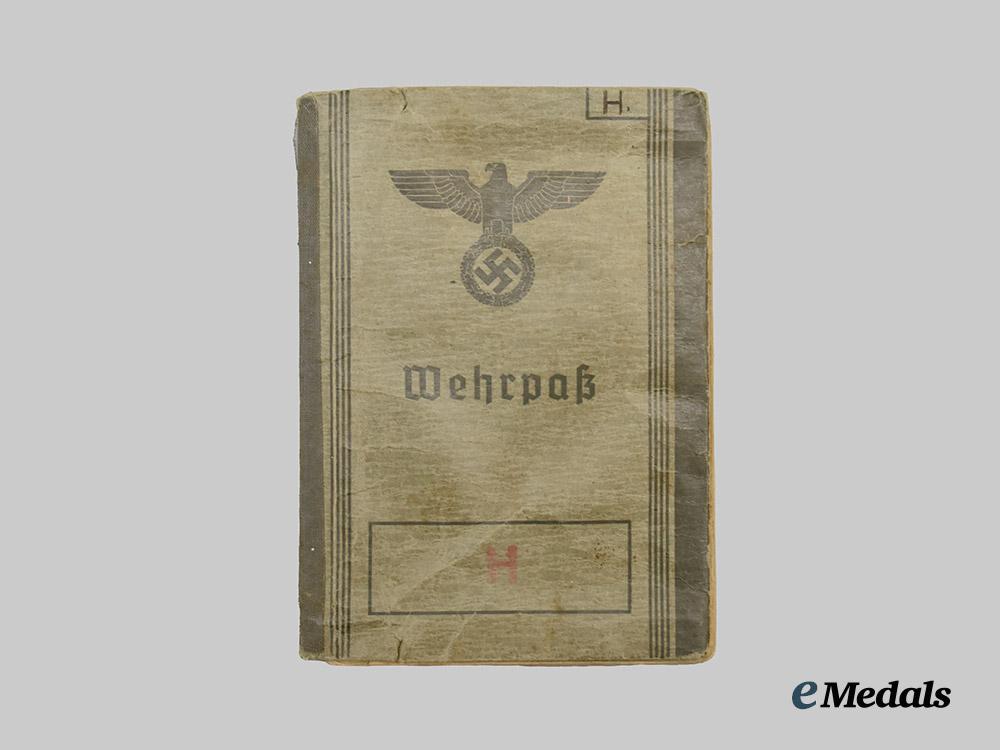 germany,_wehrmacht._a_pair_of_wehrpässe,_close_combat_and_narvik_service___m_n_c9825