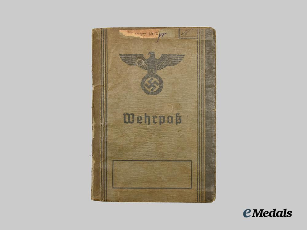 germany,_wehrmacht._a_mixed_lot_of_wehrpässe___m_n_c9844
