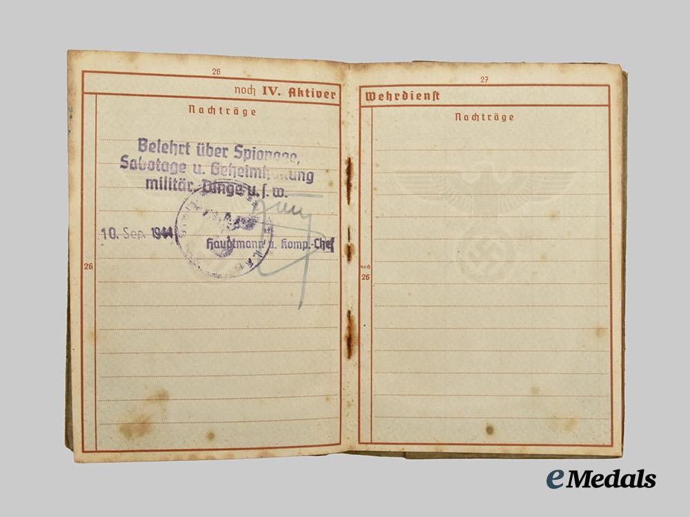 germany,_wehrmacht._a_mixed_lot_of_wehrpässe___m_n_c9851