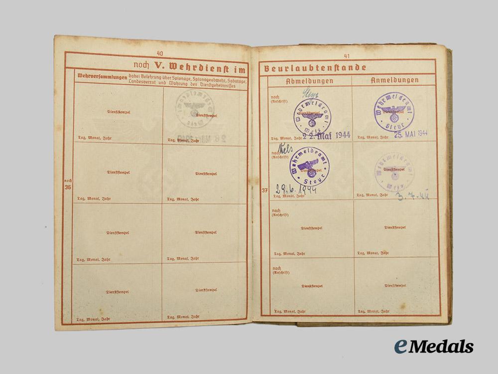 germany,_wehrmacht._a_mixed_lot_of_wehrpässe___m_n_c9853