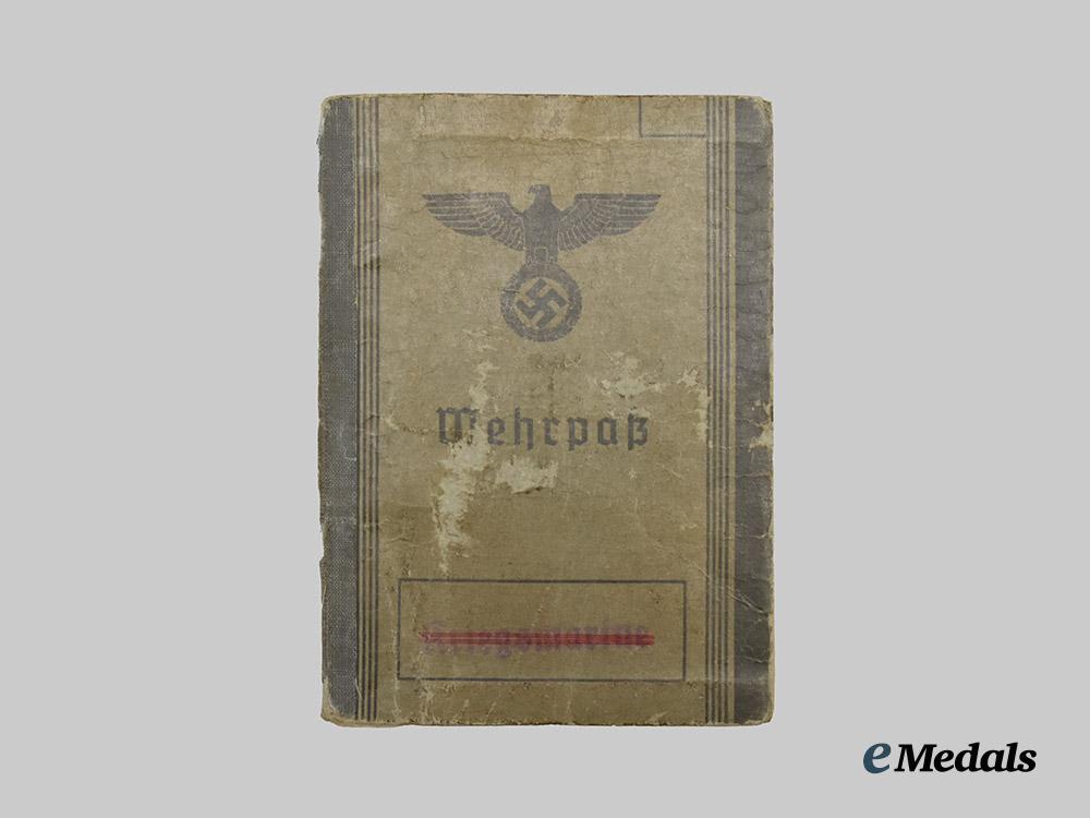 germany,_wehrmacht._a_mixed_lot_of_wehrpässe___m_n_c9856