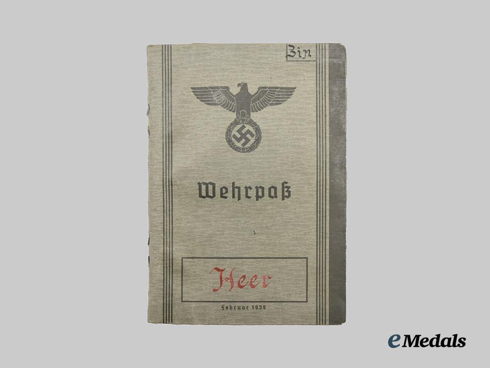 germany,_wehrmacht._a_mixed_lot_of_wehrpässe___m_n_c9865