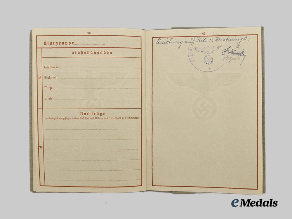 germany,_wehrmacht._a_mixed_lot_of_wehrpässe___m_n_c9871