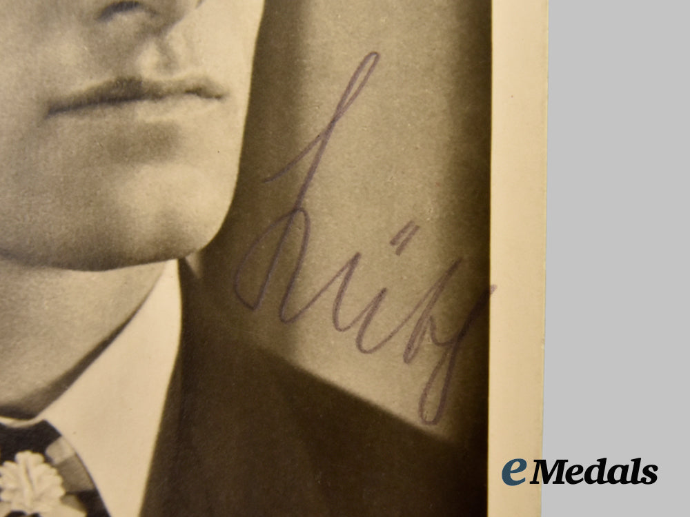 germany,_kriegsmarine._a_wartime_signed_postcard_of_u-_boat_ace_wolfgang_lüth___m_n_c9922