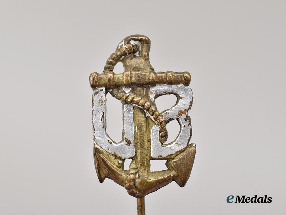 germany,_kriegsmarine._a_rare_austrian_u-_boat_crewman’s_sleeve_insignia,_with_stick_pin_miniature___m_n_c9986