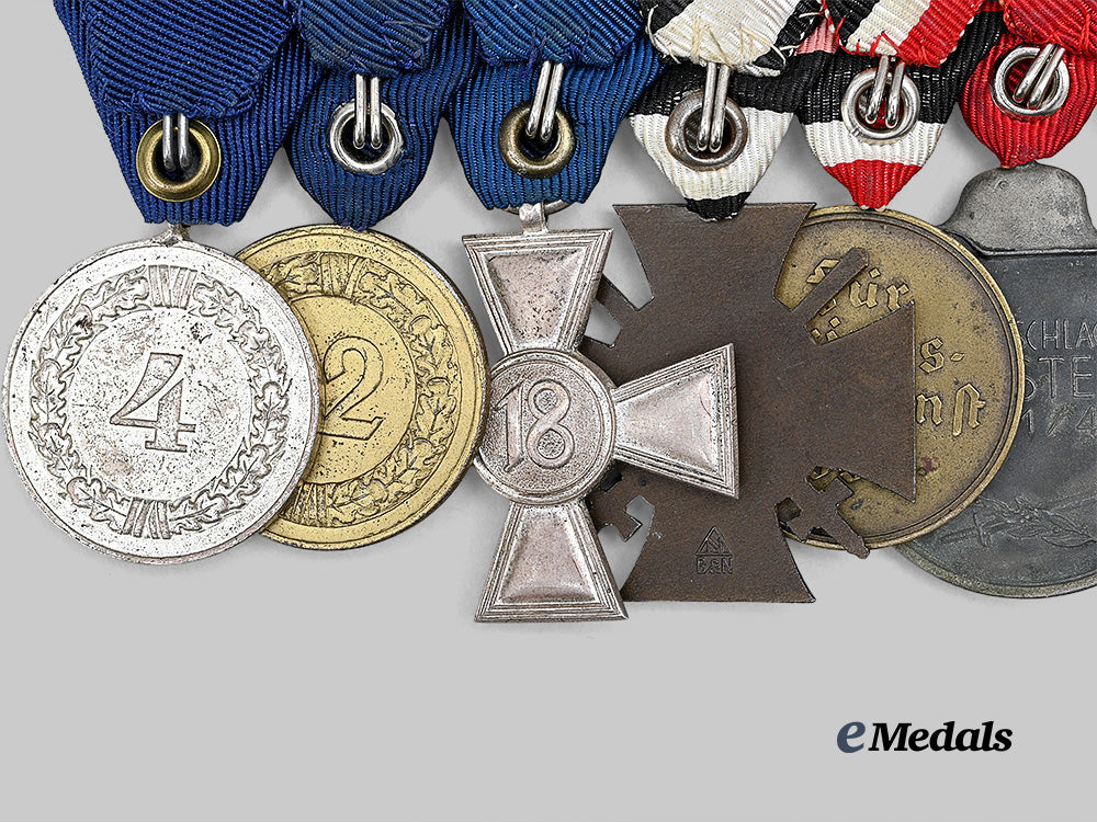 germany,_wehrmacht._a_combatant’s_medal_bar_for_bravery_and_long_service,_mounted_in_austrian_style_e_medals__g62691_7